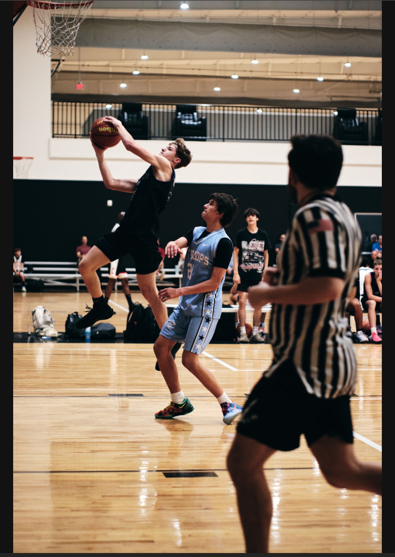 Hurricane Elite player fast break layup